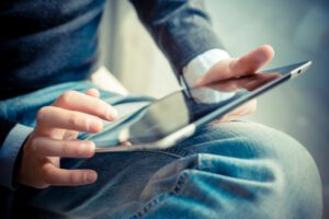 person working on ipad