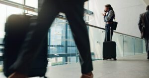 person with a suitcase in work environment