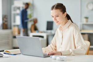 person sitting looking at computer