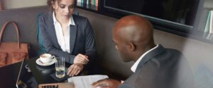 two people working together