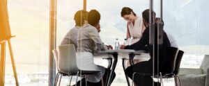 group of people working at a table