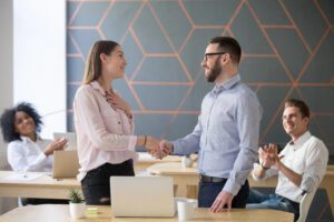employees shaking hands