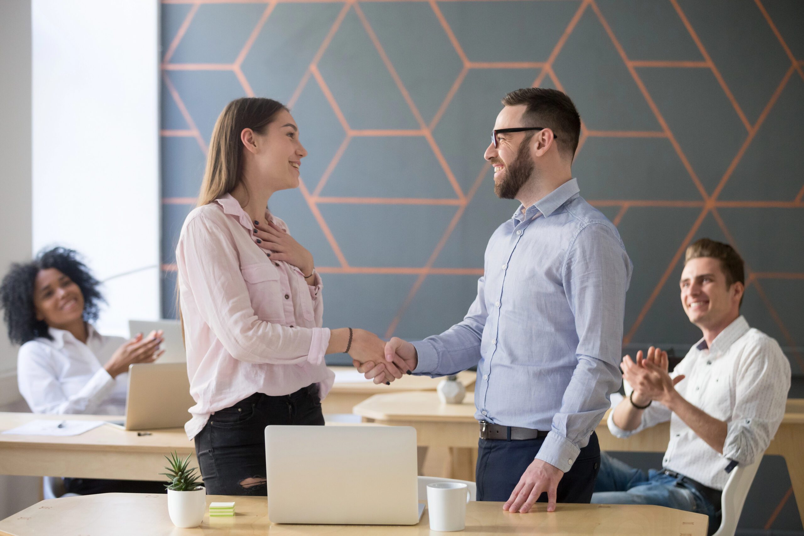 employees shaking hands