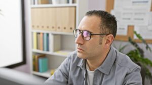 person staring at computer