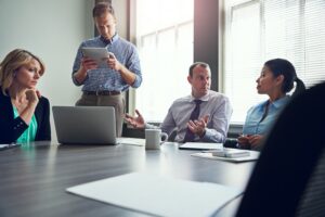 people working together at a desk